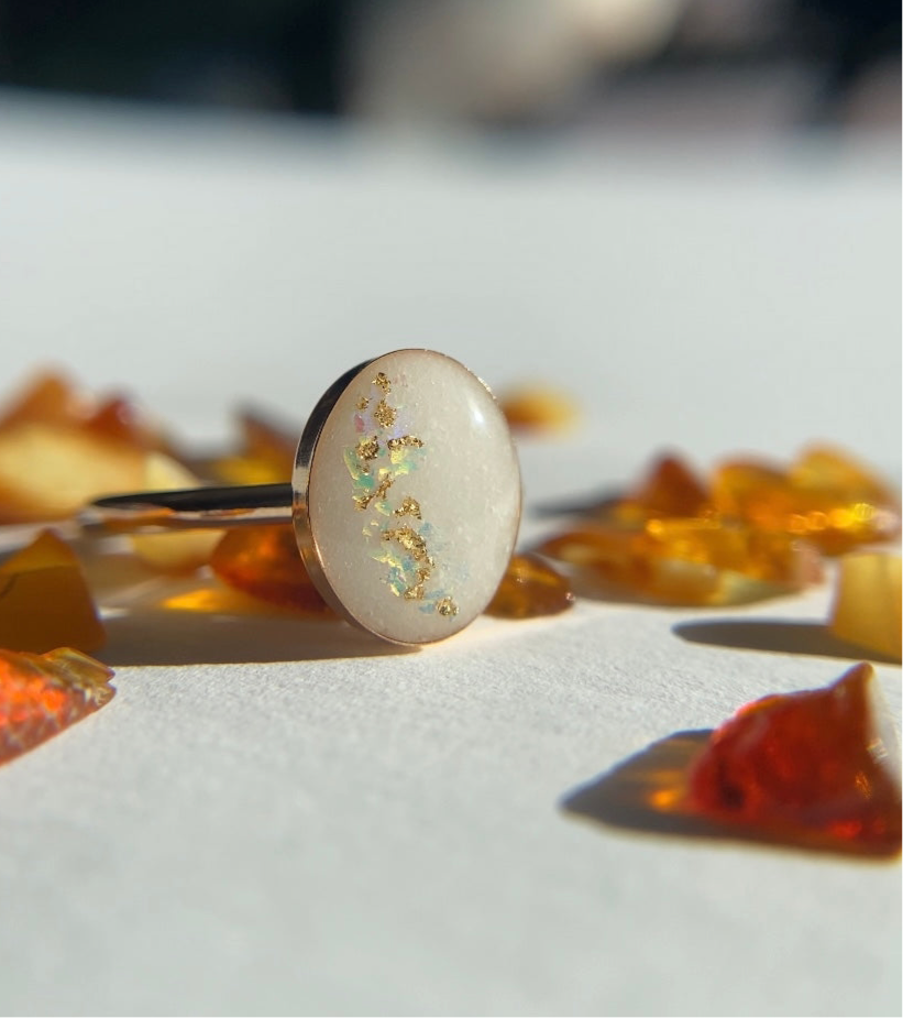 breastmilk cremation ash keepsake ring with gold flakes and opal flakes