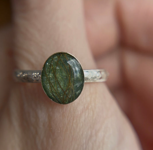 Green memorial ring with beard hair