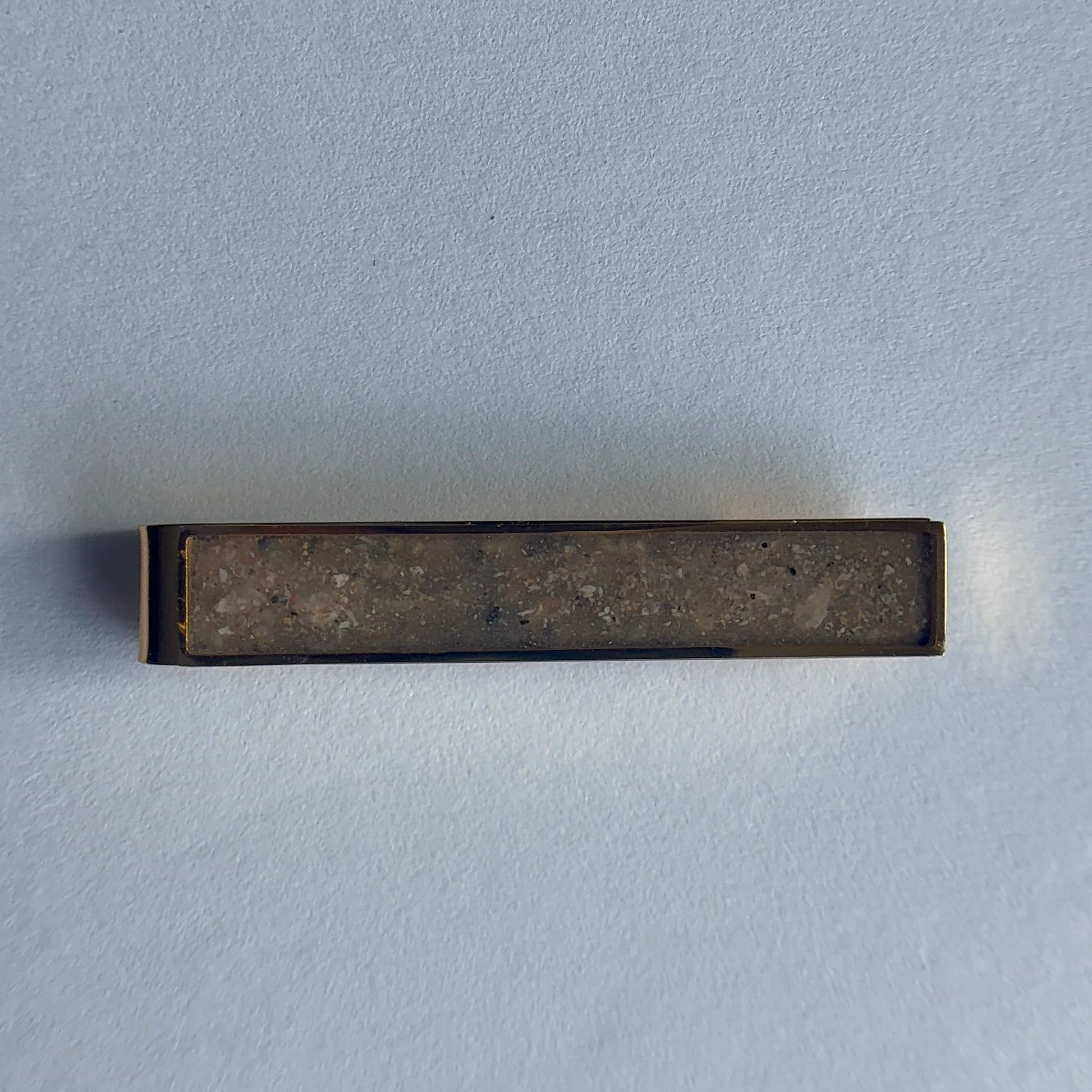 Memorial ash tie clip with cremation ashes