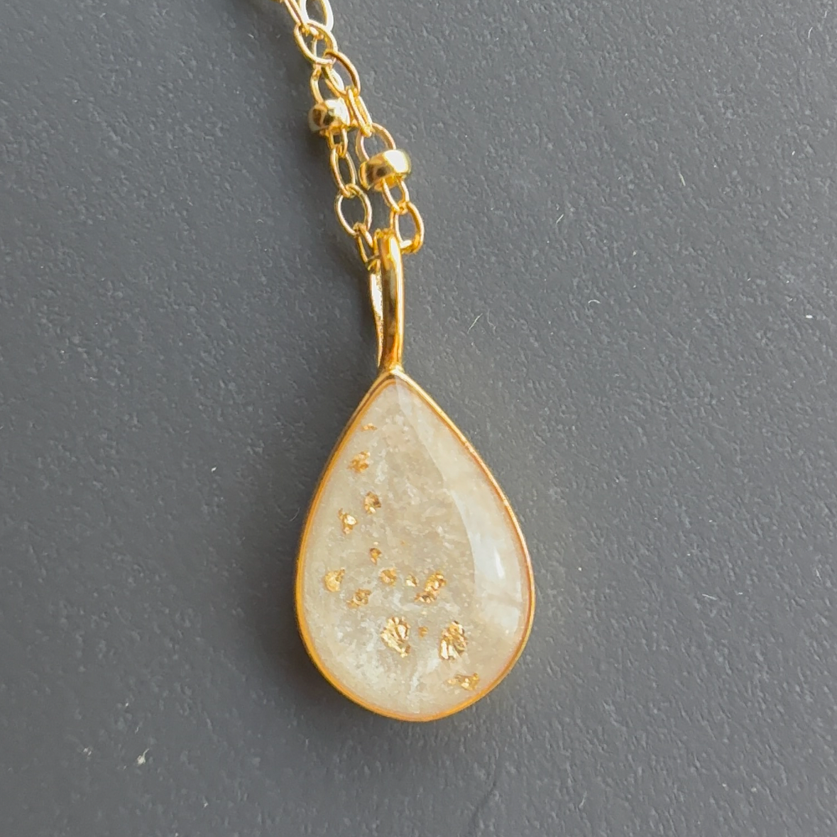 Tear drop cremation pendant with ashes 