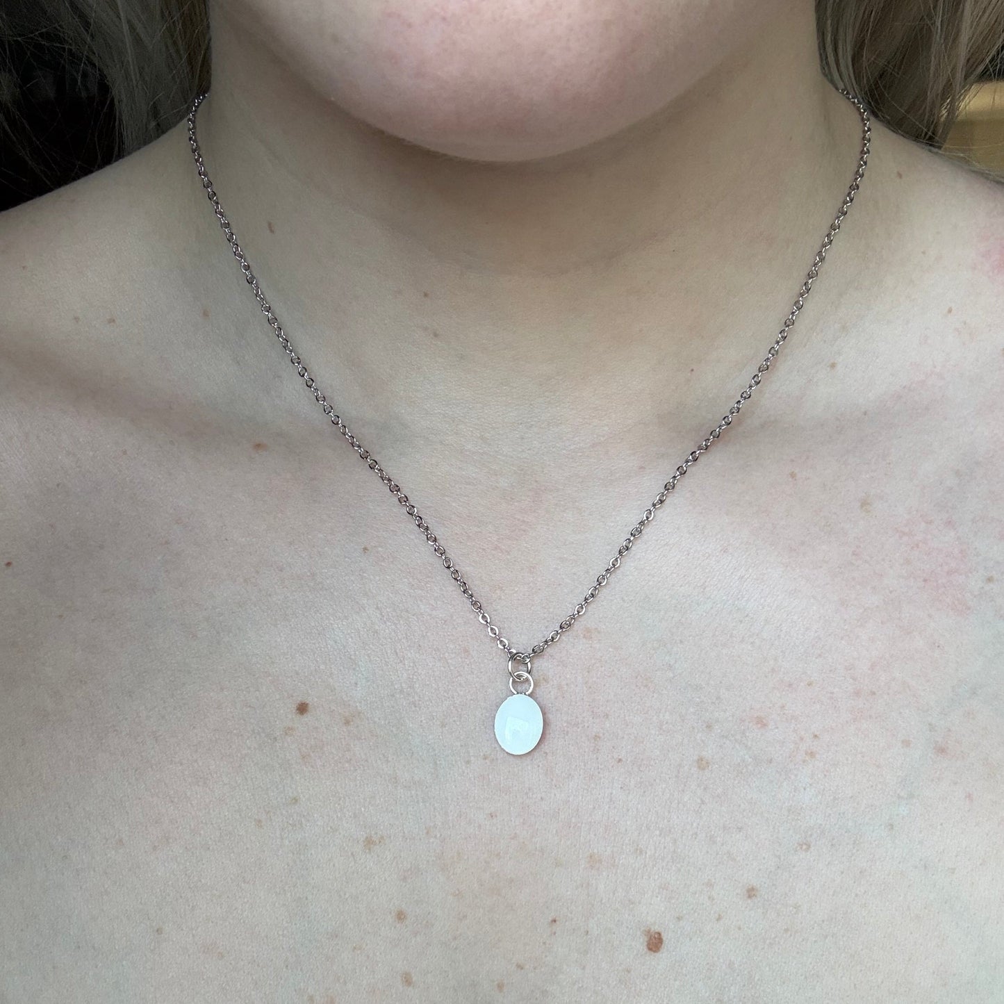 Small silver or gold oval Pendant with ashes or breastmilkmemorial keepsake