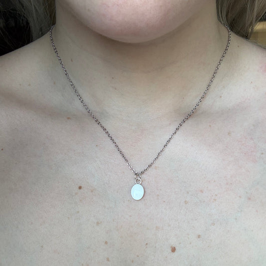 Small silver or gold oval Pendant with ashes or breastmilkmemorial keepsake