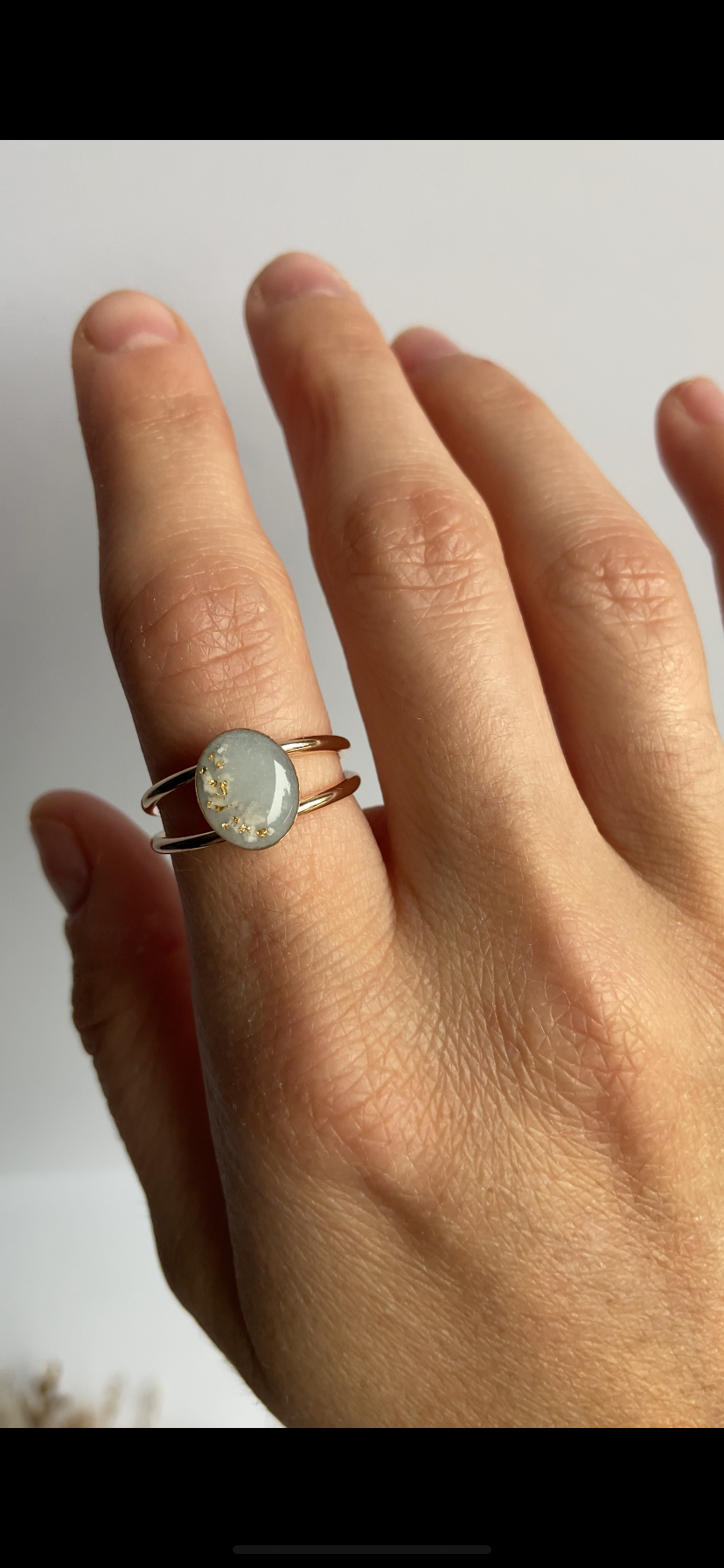 Emery Double Band Ring worn, carrying two personal inclusions