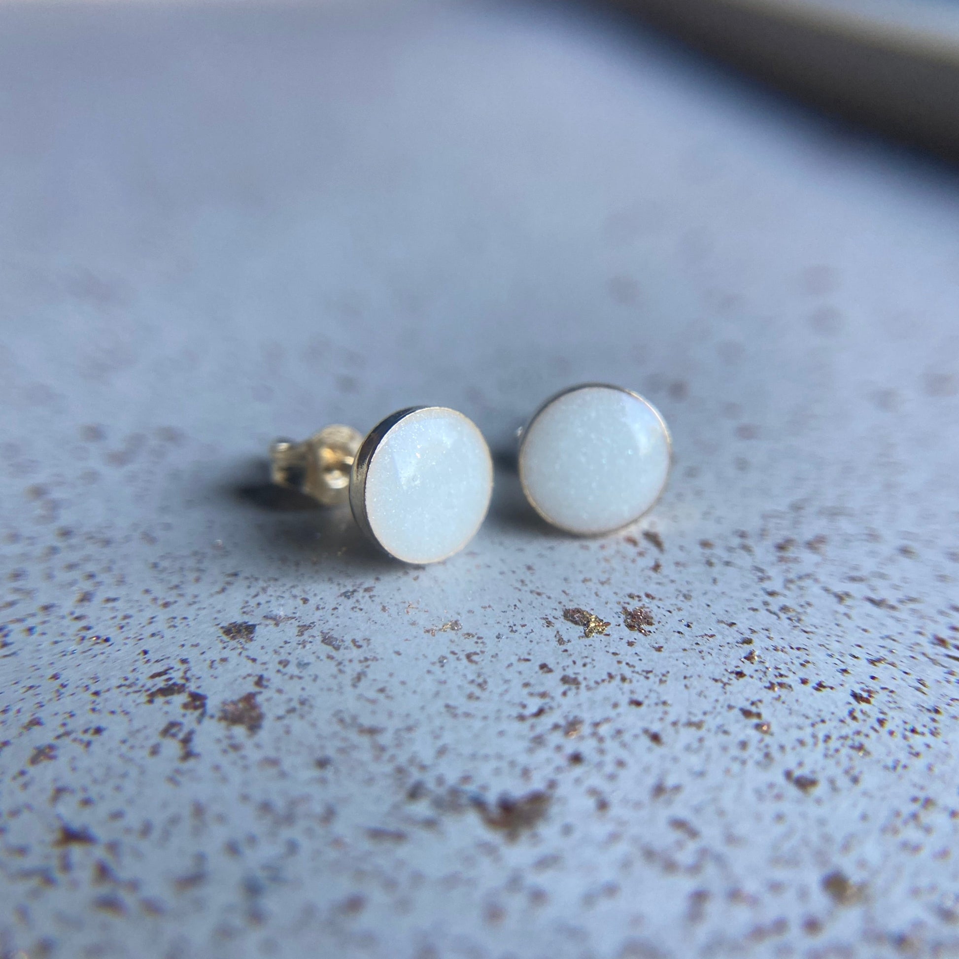 Kimberly Round Earrings holding breastmilk or ashes, memorial jewelry infused with crystal energy