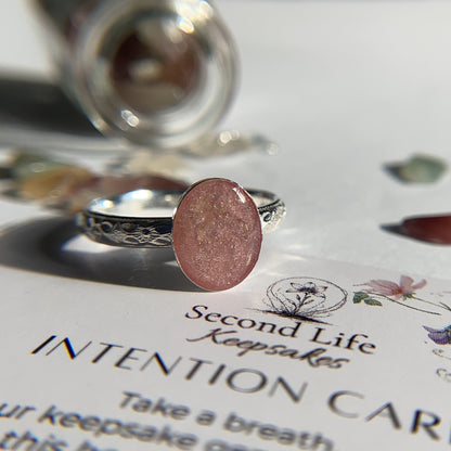 silver floral keepsake ring with pink stone with cremation ashes